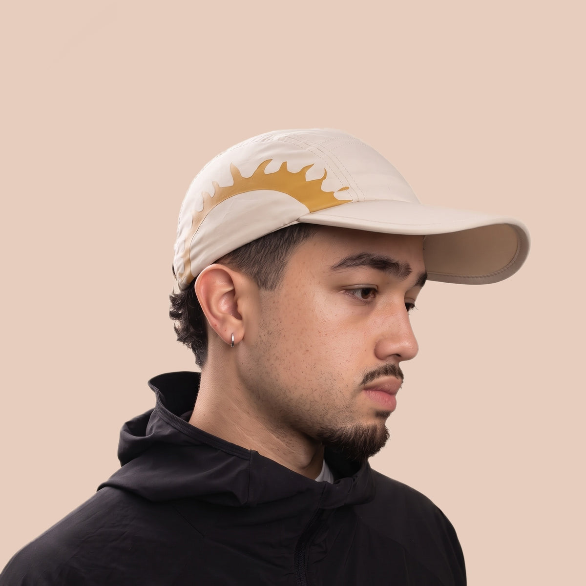 Man wearing the cream HOJA SOL Cap at a three-quarter angle